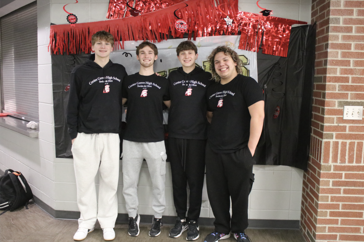 After the Franklin Central swim meet ended in a decisive sweep, the boys' swim team gathers in the cafeteria for brief hangout. The seniors got a chance to show off their favorite moment with poster boards as well as take some photos commemorating their achievements. "It was really fun to get to train with my fellow seniors. I got to grow closer to these guys and I have a very special bond with them”.